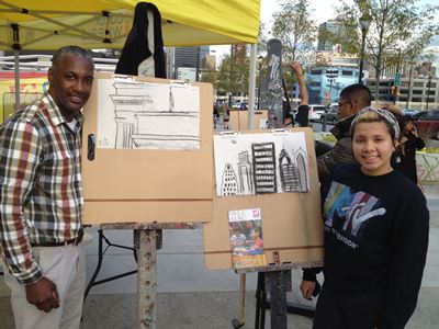 Fleisher Art Memorial's ColorWheels van, a mobile art studio. Pictured is an outdoor landscape sketching activity at 30th St. Station- Philadelphiaâs Grand Central Station. Commuters and those passing by were invited to stop and sketch their urban landscape