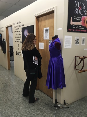 A visitor to the exhibit Daina Coffey helped curate for Joel Hall Dancers Center