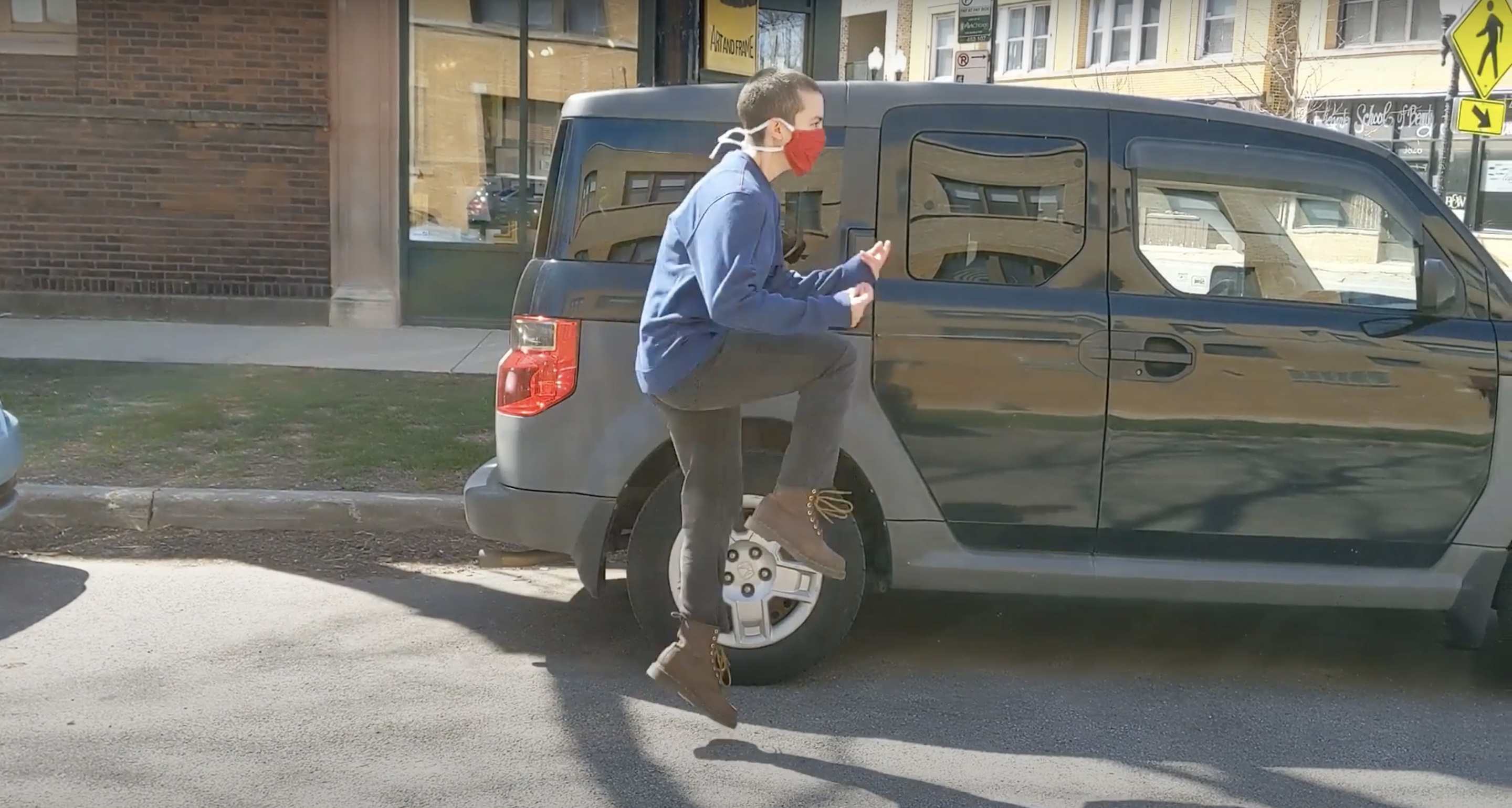 Kait Dessoffy dancing through the streets during quarantine.
